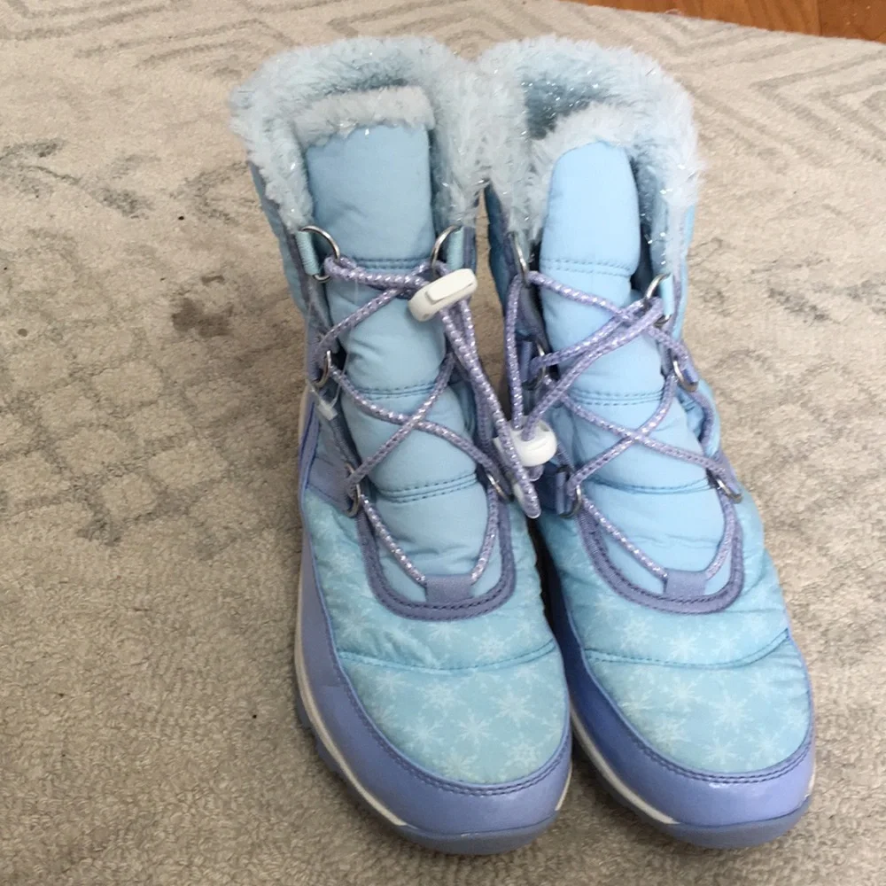 Blue Disney/Sorel snow boots with snowflakes